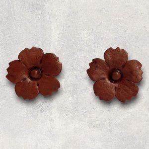 Rare leather imprint flower earrings.